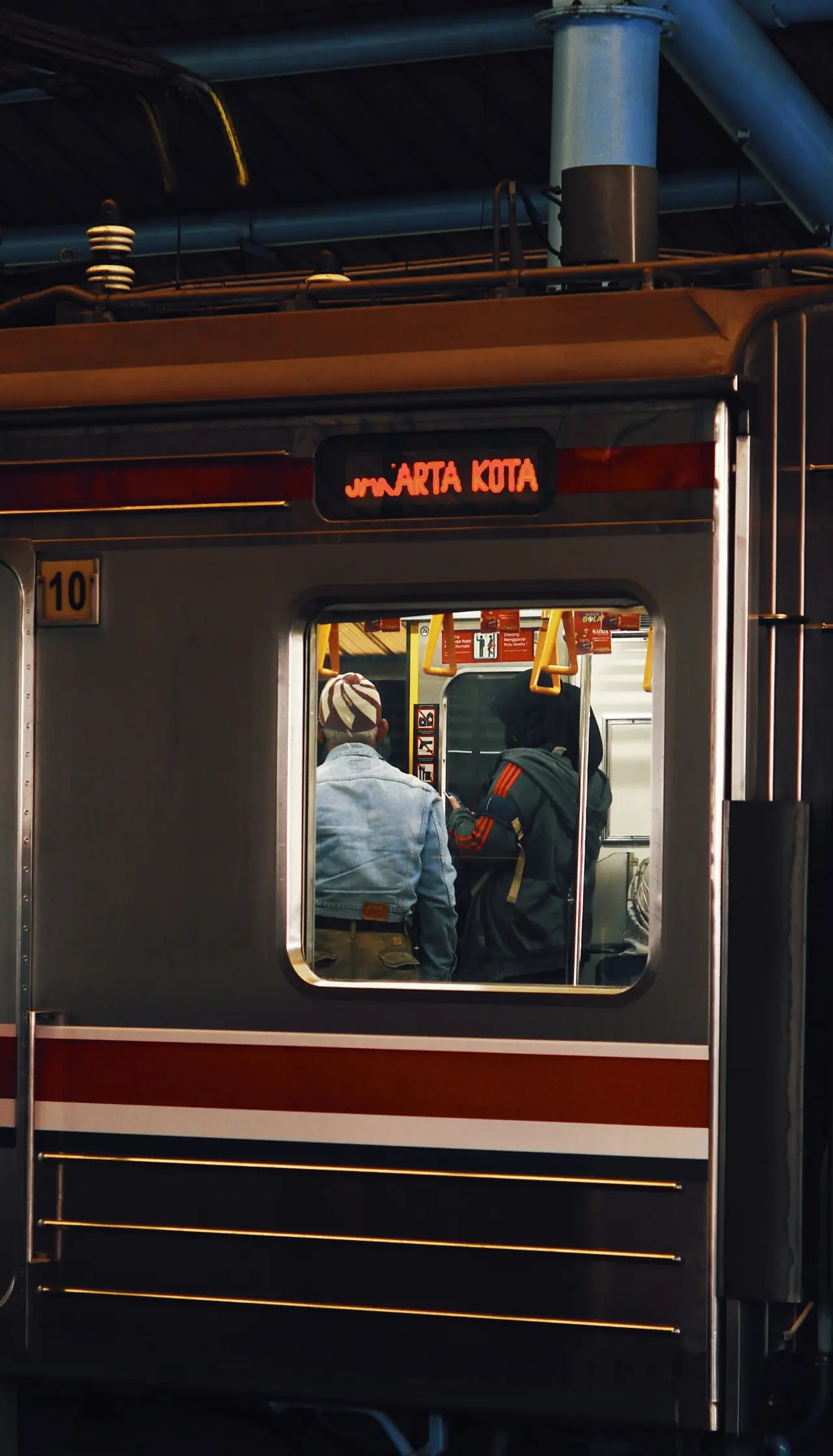 Passengers aboard a commuter train