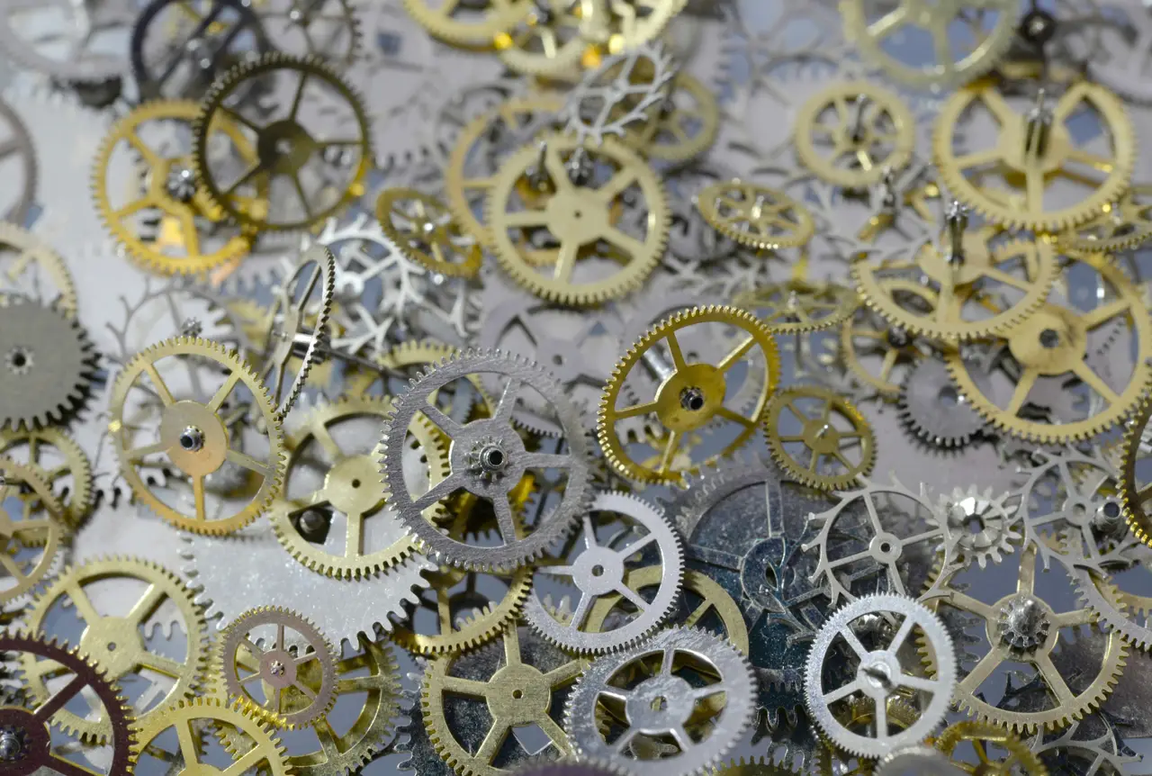 A pile of precision-machined steel gears
