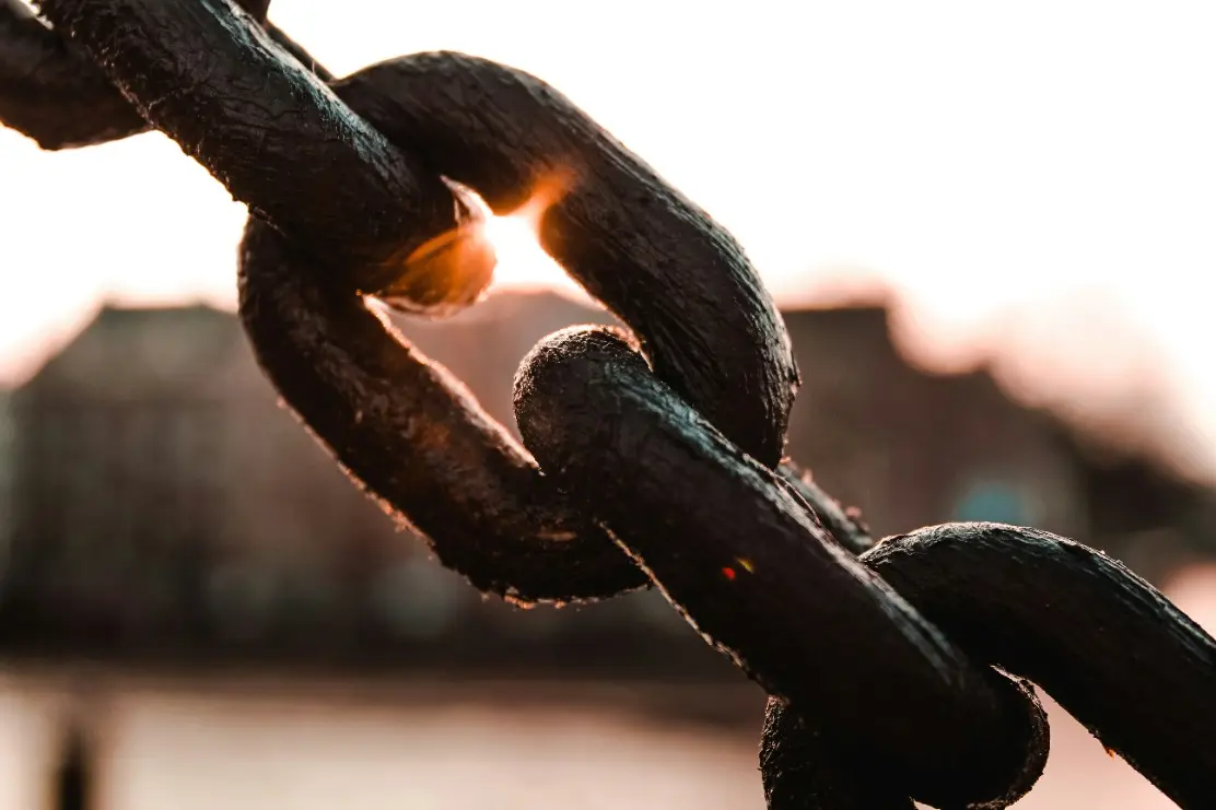 Close-up of interlocking steel chain links
